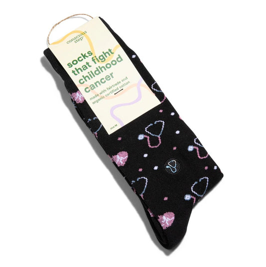 Black sock with heart patterns on a white background