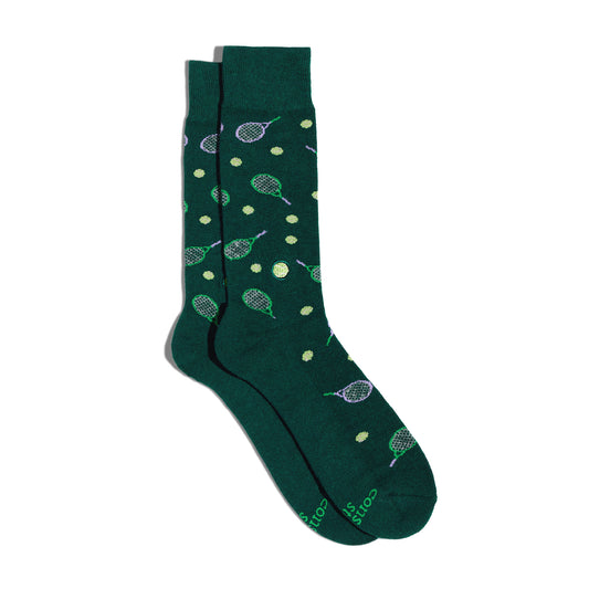 Green socks with tennis racket and ball pattern on a white background