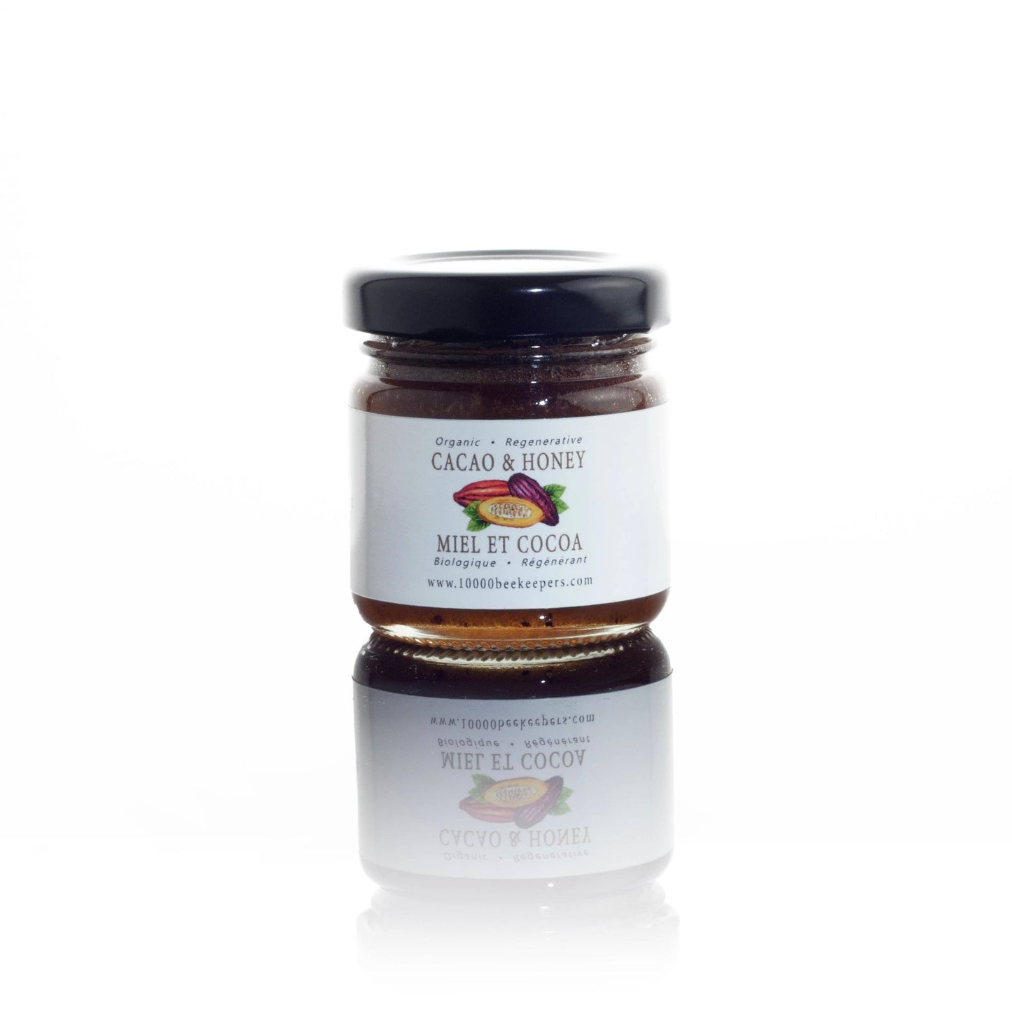 Small jar of Cacao Honey on a white background