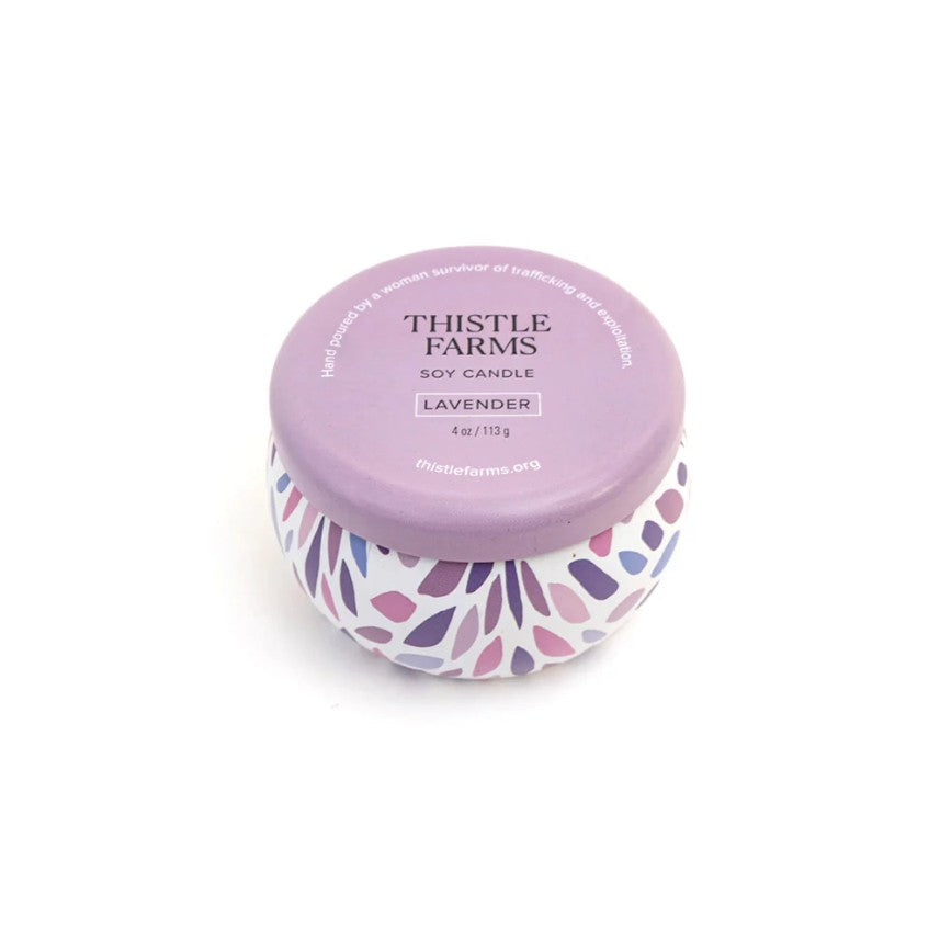 Thistle Farms lavender candle on a white background