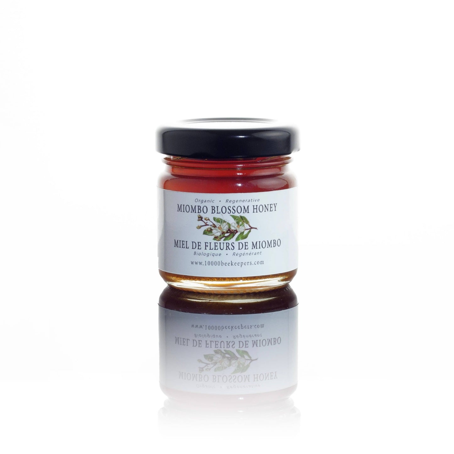Jar of Miombo Blossom Honey on a white background