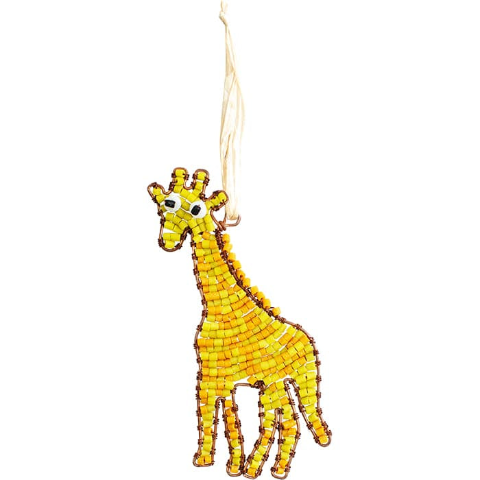 Golden colored bead and wire giraffe ornament hanging with a raffia cord on a white background