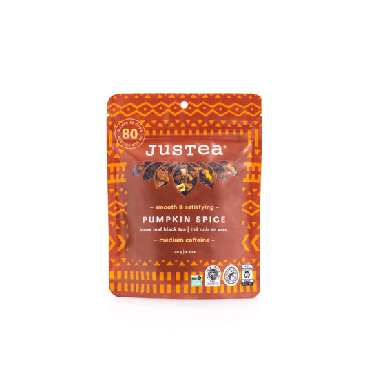 Justea Pumpkin Spice tea package on a white background
