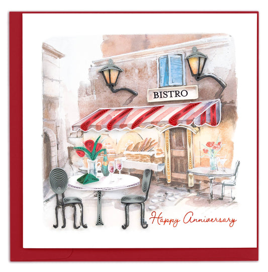 Quilled card featuring a bistro table set outside a Parisian-style cafe.