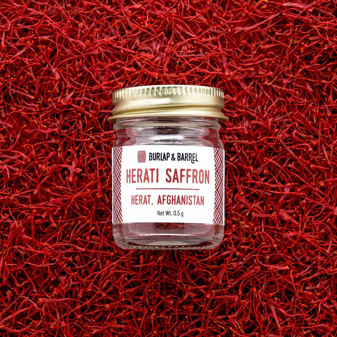 Jar of Herati Saffron on a red saffron background
