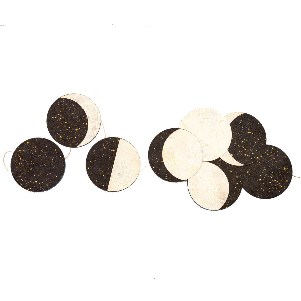 Decorative banner with black and white circular patterns on a white background