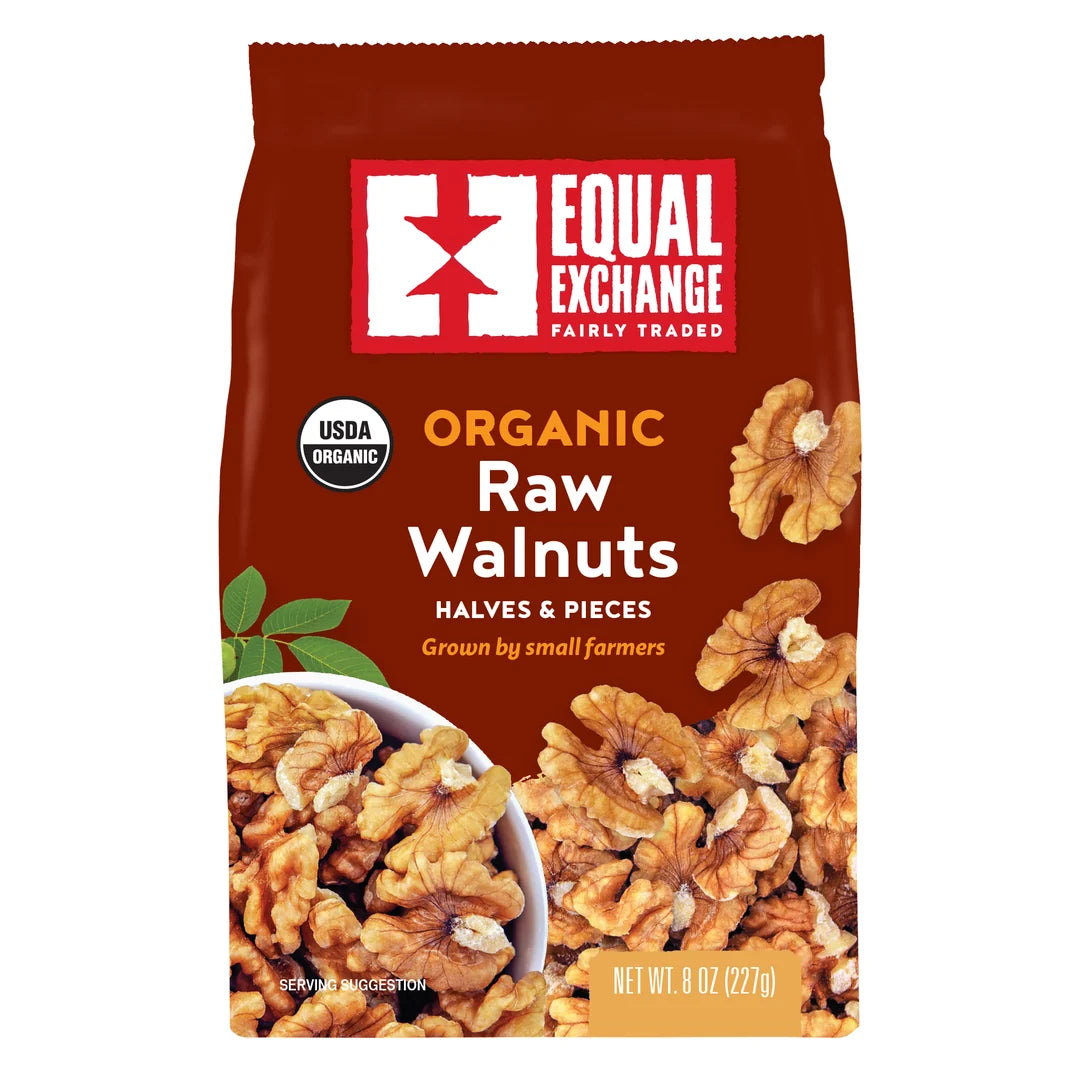 Equal Exchange Organic Raw Walnuts front packaging red background with raw walnuts