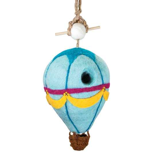 felted hot air balloon bird house with blue body, yellow basket, and pink ribbon on a white background