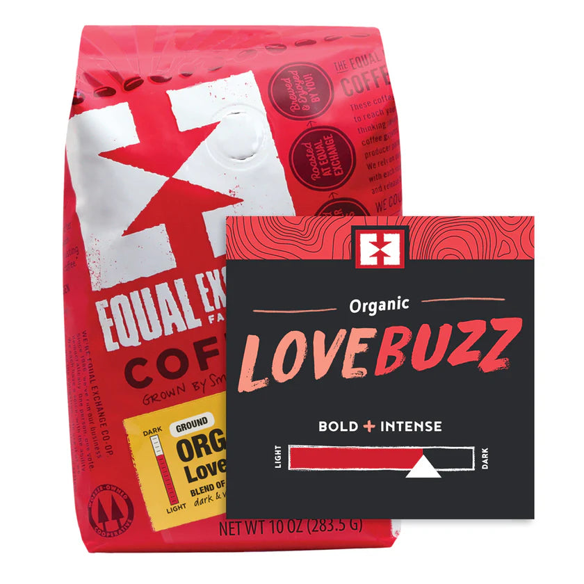 Two Equal Exchange Love Buzz coffee packages, one red and white, the other black and red, on a white background.