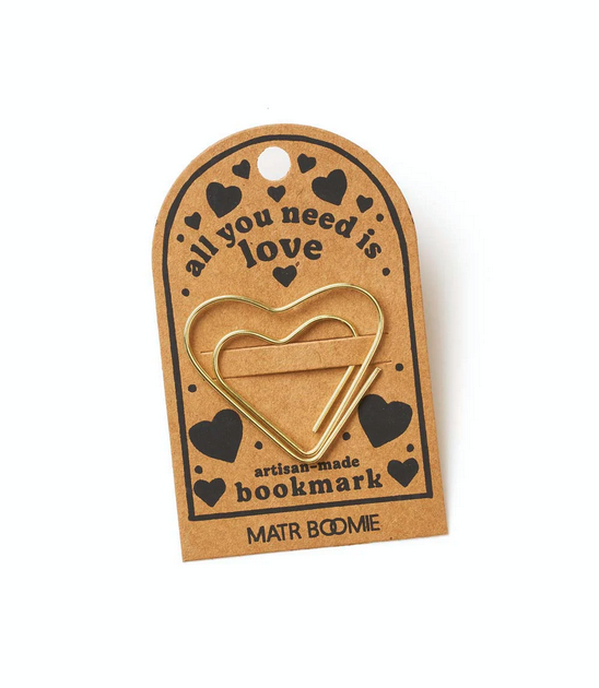 Gold wire heart-shaped bookmark attached to cardstock with the words "all you need is love"