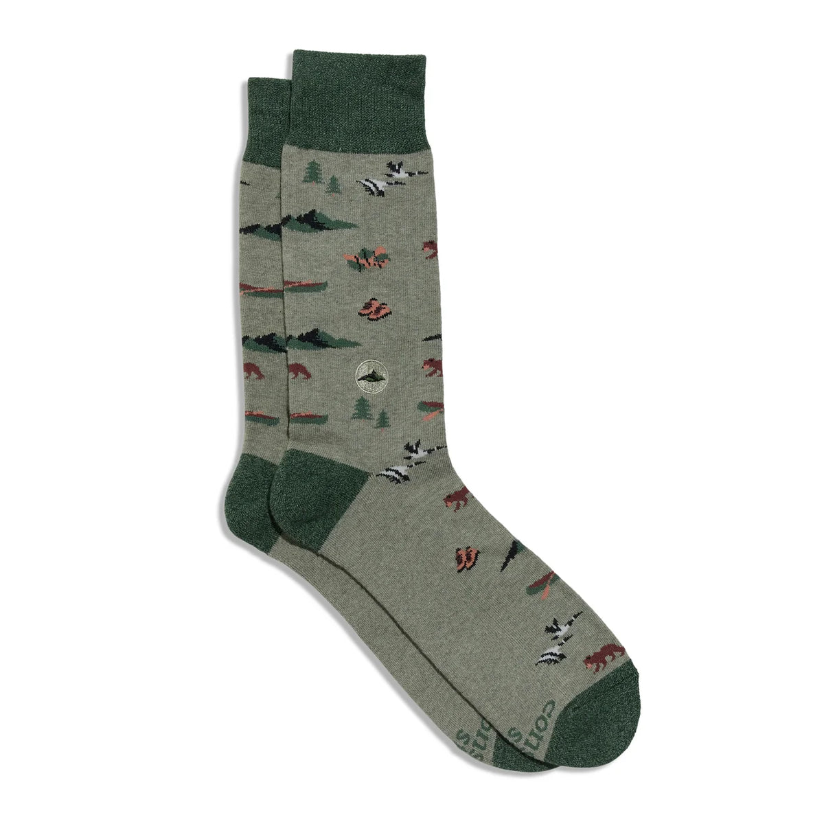 Conscience step socks. Light green field with dark green toes, heals and top. Small wild animals and outdoor gear knitted into the light green field.