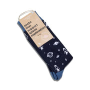 conscience step space socks with dark blue field and small white outer space theme. light blue heal, toe and top in a brown package with black writing